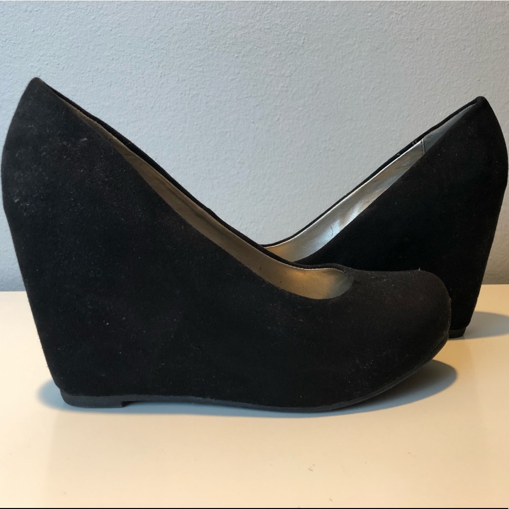 Black suede covered wedge heels